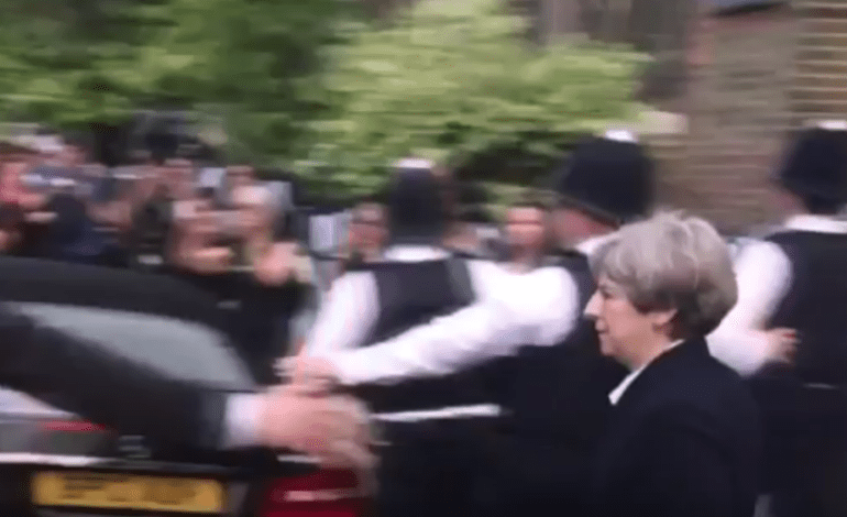 Theresa May forced to flee public