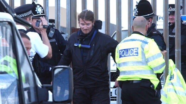 Spycop Mark Kennedy (centre)