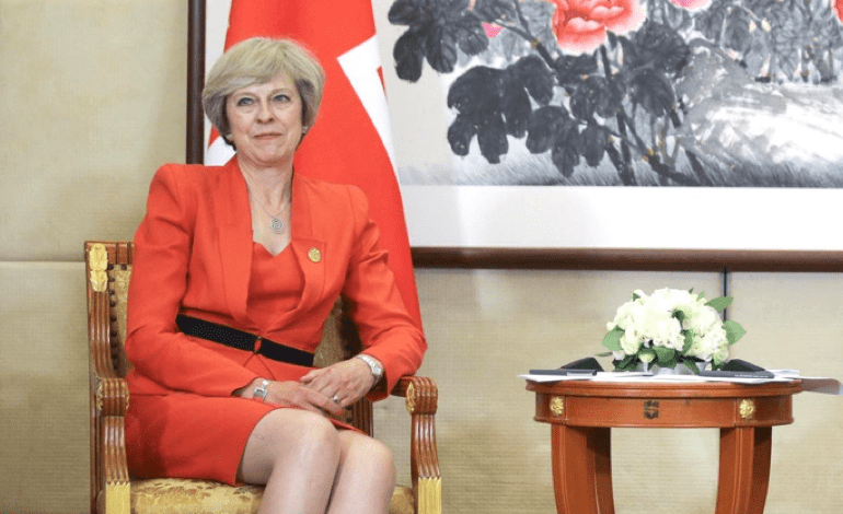 Theresa May pleased