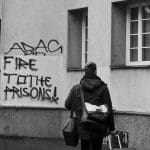 "Fire to the prisons!" graffiti