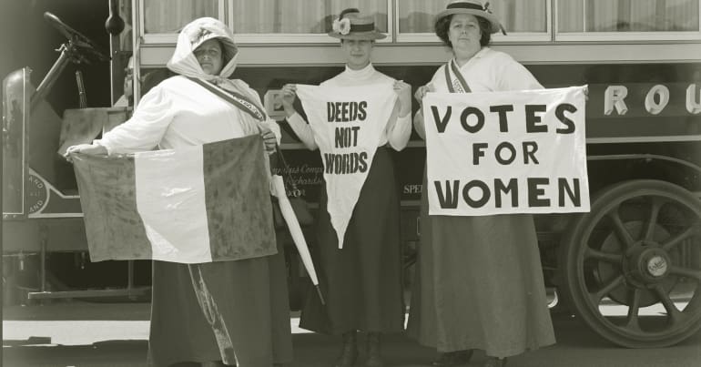 suffragettes with banners
