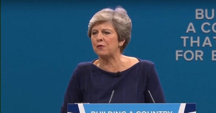 Theresa May at podium