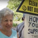 Woman protesting outside drilling site company seeking injunction
