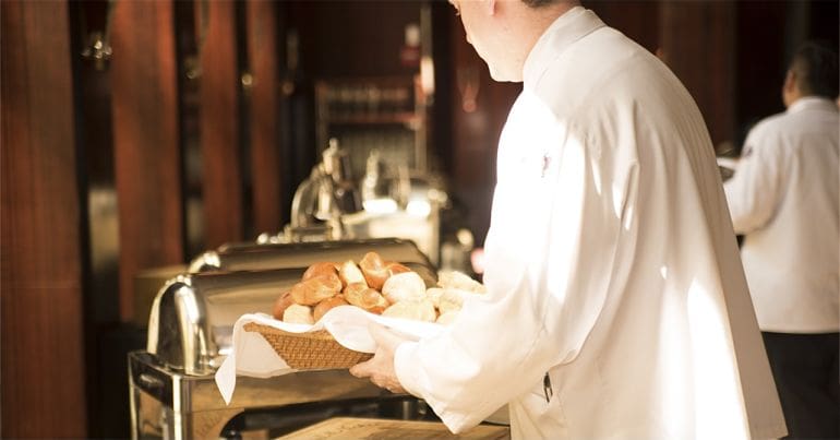 Underpaid workers minimum wage picture of hotel worker