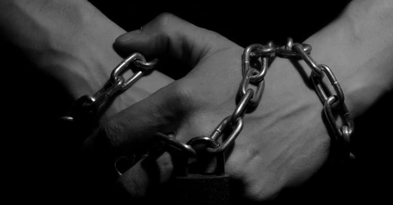 Hands in chains modern slavery