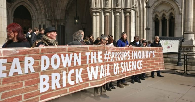 Victims of police spying outside the High Court