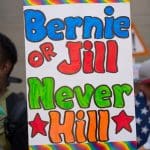 Leftists hold up sign for Bernie Sanders and Jill Stein