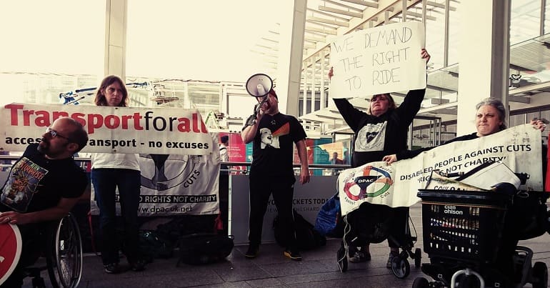 Disabled people protesting at London Bridge about public transport