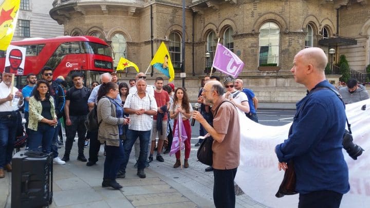 Dr Levidow speaks to crowd at start of Global Day of Action