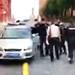 An image from Peter Tachells arrest at the start of the World Cup