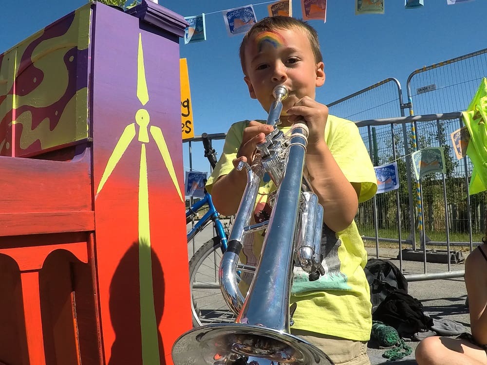 A child playing a trumpet