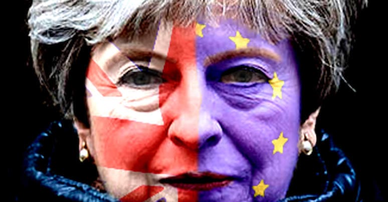 Theresa May with EU and Union jack projected onto her face