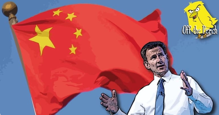 Jeremy Hunt in front of the Chinese flag