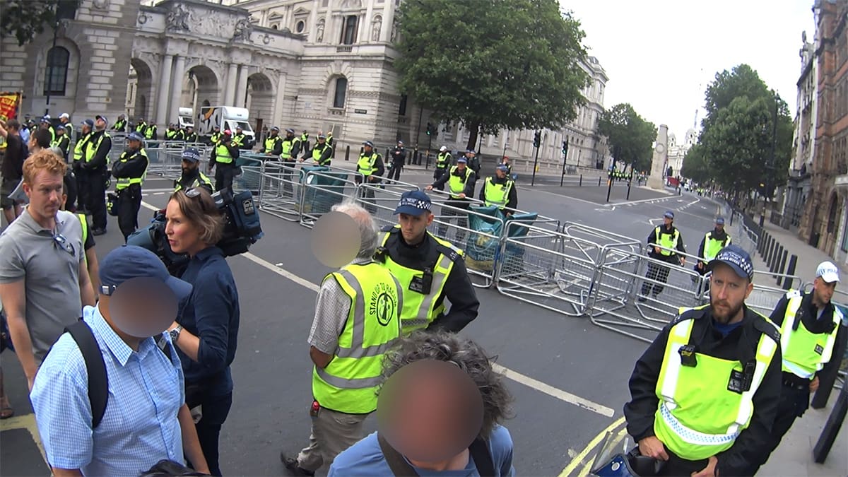 Police stood behind barriers