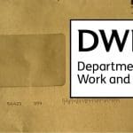 A ripped brown envelope and the DWP logo