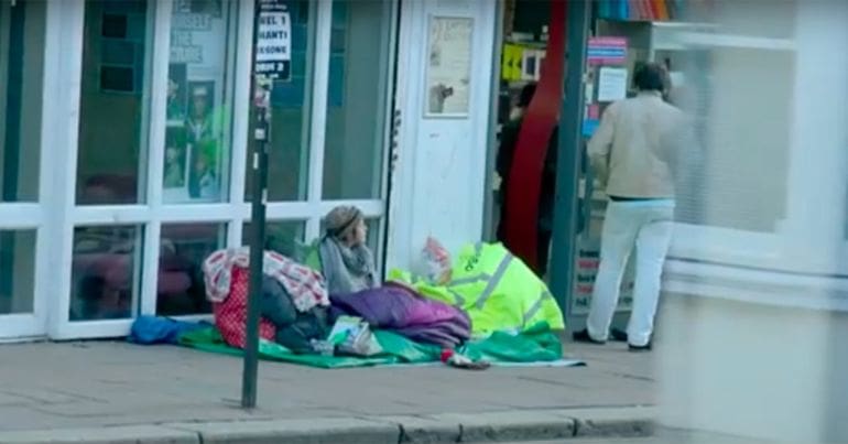 Homeless woman on the streets of Brighton. Austerity.