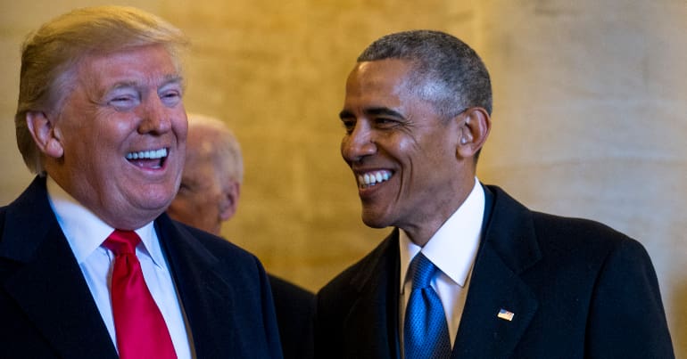 Trump and Obama smile while meeting in Washington.