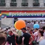 Image from London Pride 2018 - a banner reads #Pride For Everyone