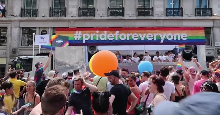 Image from London Pride 2018 - a banner reads #Pride For Everyone