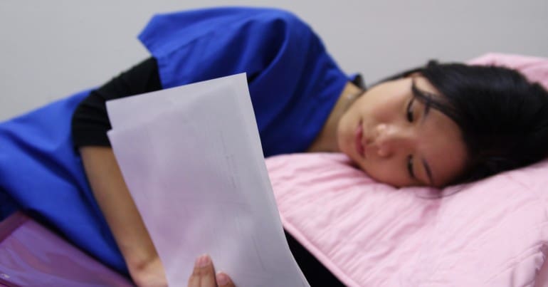 Teenager looking at exam results