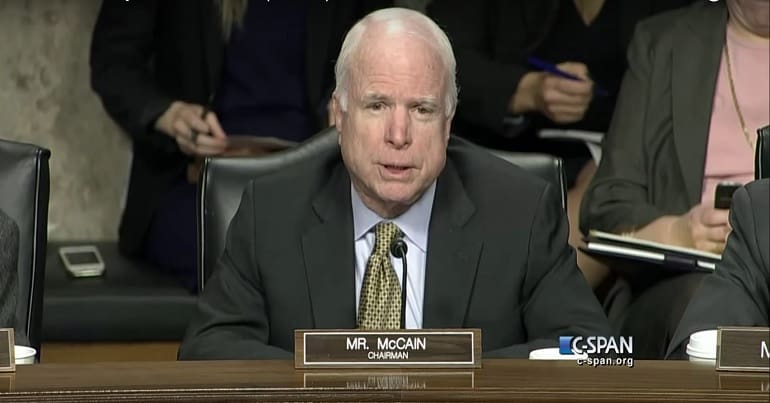 John McCain chairing Senate armed services hearing with Henry Kissinger