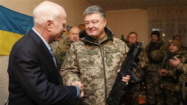 McCain shakes hands with second coup president Poroshenko