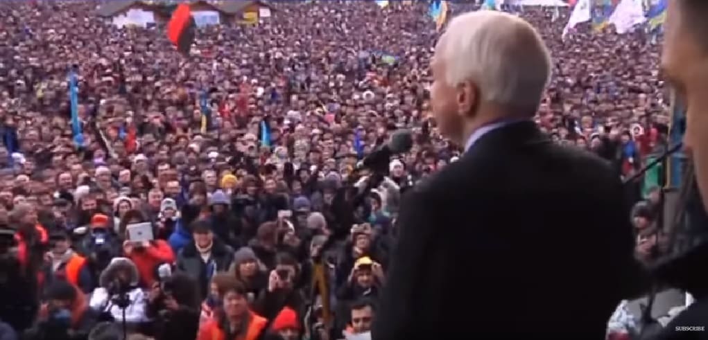 McCain addresses a crowd of anti government protesters before the coup in December 2013
