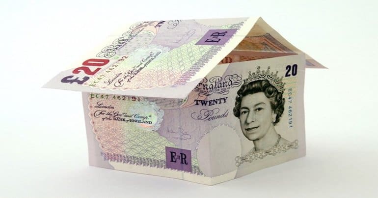 Twenty pound notes in the shape of a house
