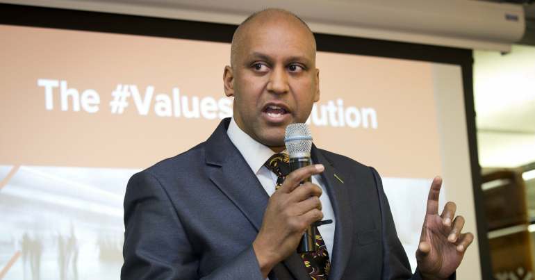 Shahrar Ali speaking at a public event.