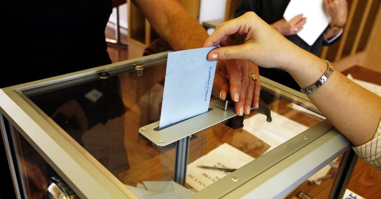 A person at the ballot box