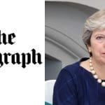 The Telegraph logo and Theresa May