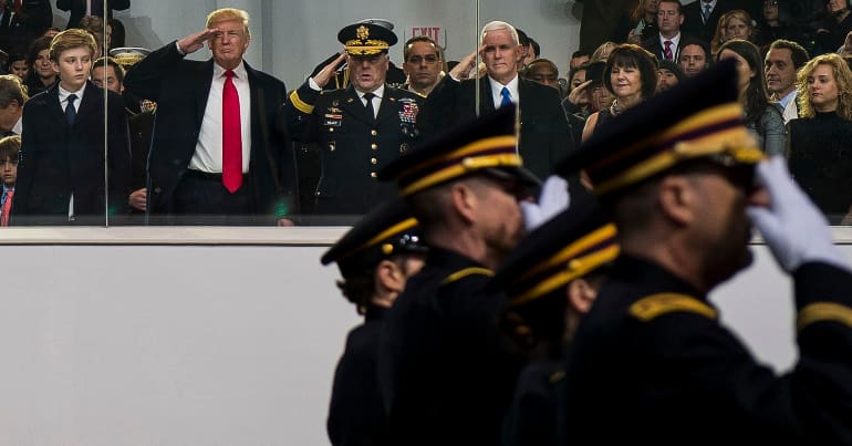 Donald Trump saluting US troops