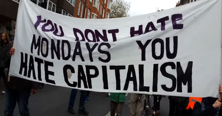 Banner saying "You don't hate Mondays, you hate capitalism"