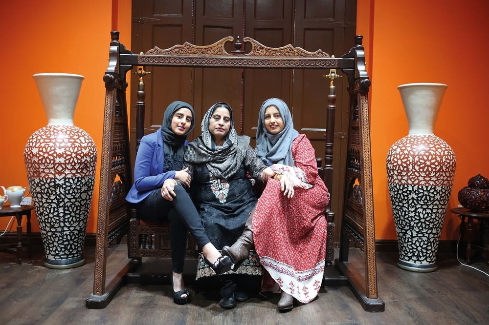 Aysha (left) and Kiran (right) with their mother Zatoon. The portrait was created in Balsall Heath, Birmingham (2017) by Inès Elsa Dalal