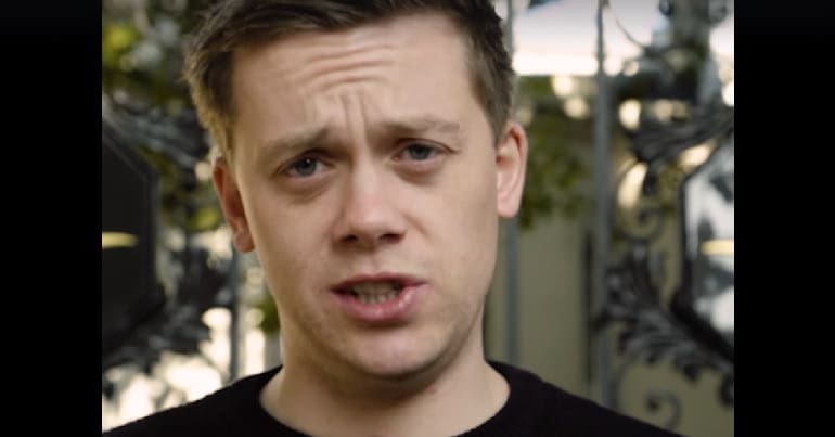 Owen Jones in front of Saudi Arabian embassy in London