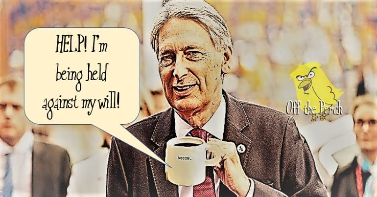 Philip Hammond with a talking coffee cup
