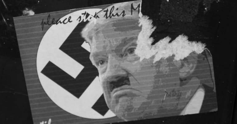 Sticker portraying Trump with a Hitler moustache in front of a Nazi flag.