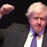 Boris Johnson with a raised fist
