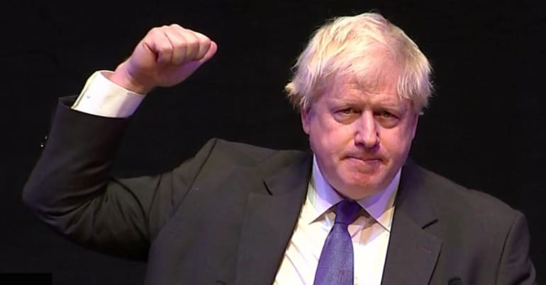 Boris Johnson with a raised fist