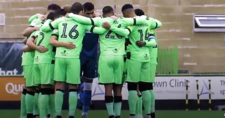 The Forest Green Rovers football team huddle
