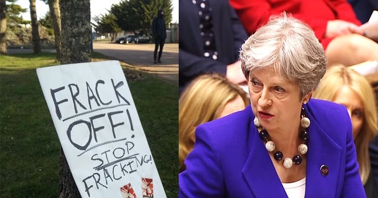A fracking protest sign and Theresa May