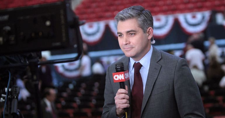 Jim Acosta speaking at a campaign rally