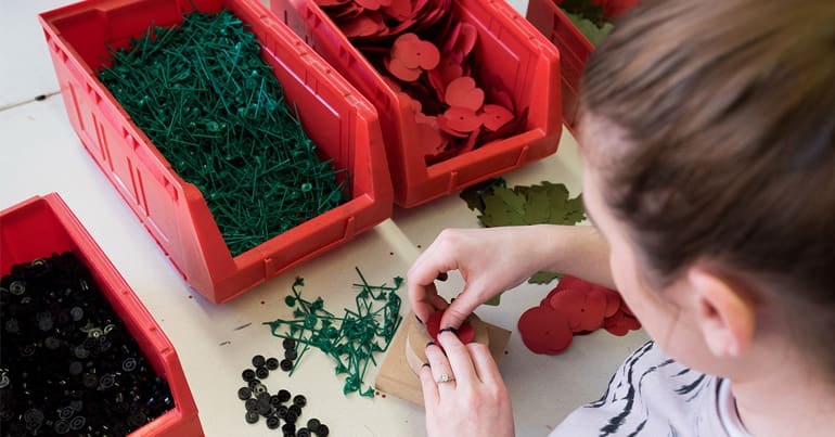 Remembrance poppies being put together