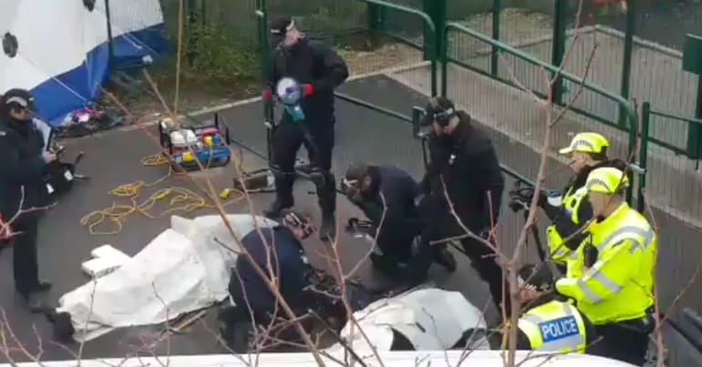 Police cutting team at anti-fracking lock on at Tinker Lane, Nottinghamshire