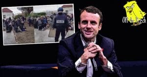 Macron with an image behind him of children being held at gunpoint