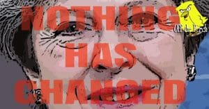 Theresa May with the words 'NOTHING HAS CHANGED' over her face