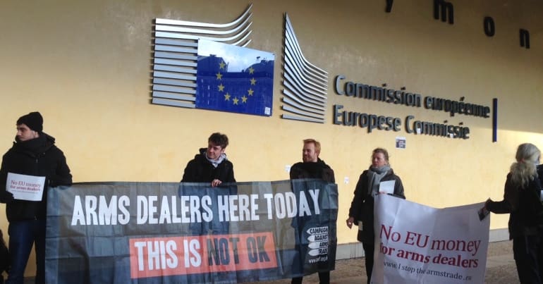 Protest against arms dealers outside the European Commission in Brussels
