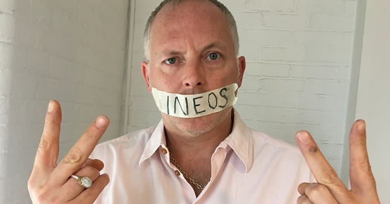 Joe Corre with fracking company Ineos written on tape across his mouth