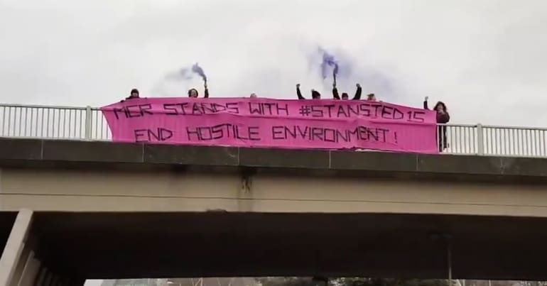 Pink banner in Manchester supporting the Stansted 15