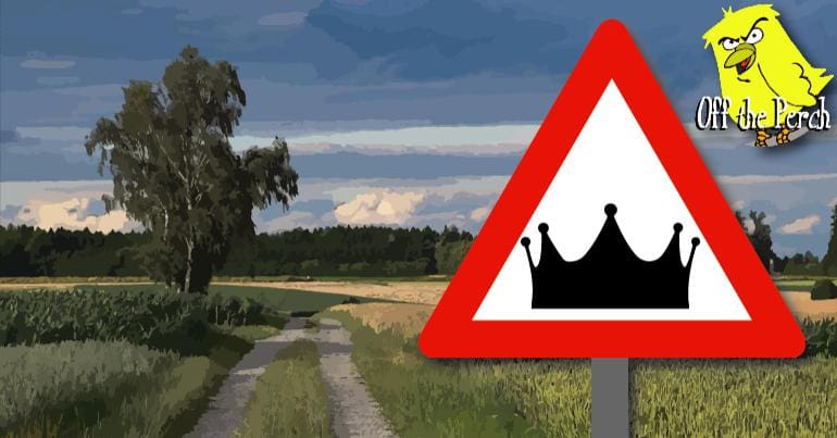 Roadside warning sign with a crown on it